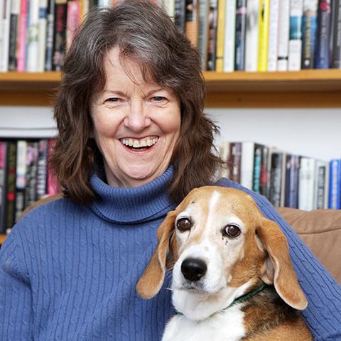 Celeste Fripp holding a dog