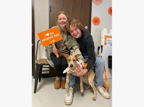 Skipper the dog with his family